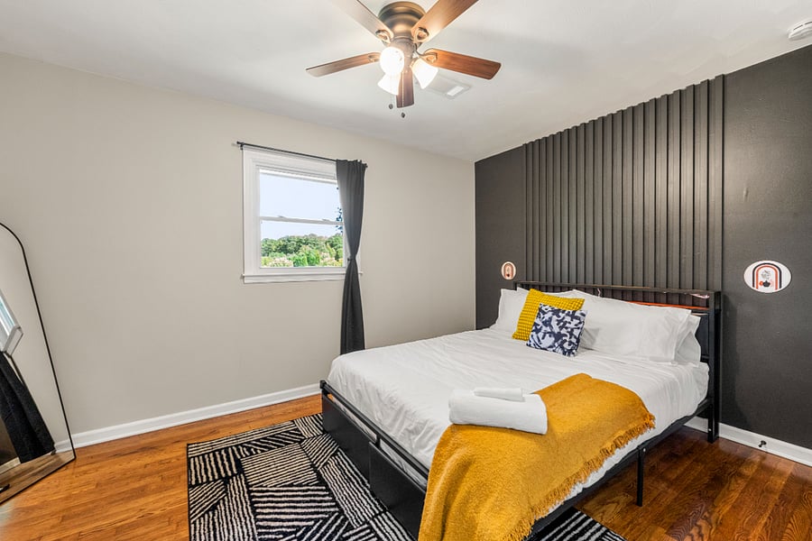 Bedroom 2: Queen size LED bed with TV, black out curtains and noise machine.