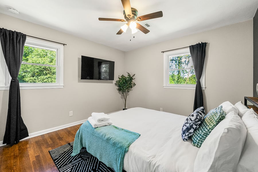 Bedroom 2: Queen size LED bed with TV, black out curtains and noise machine.
