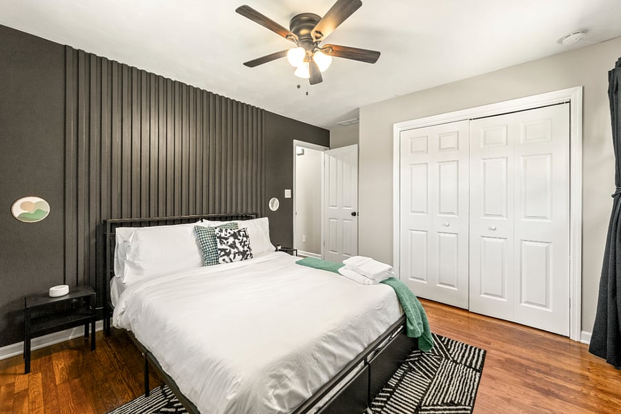 Bedroom 5: Queen size LED bed with TV, black out curtains and noise machine.