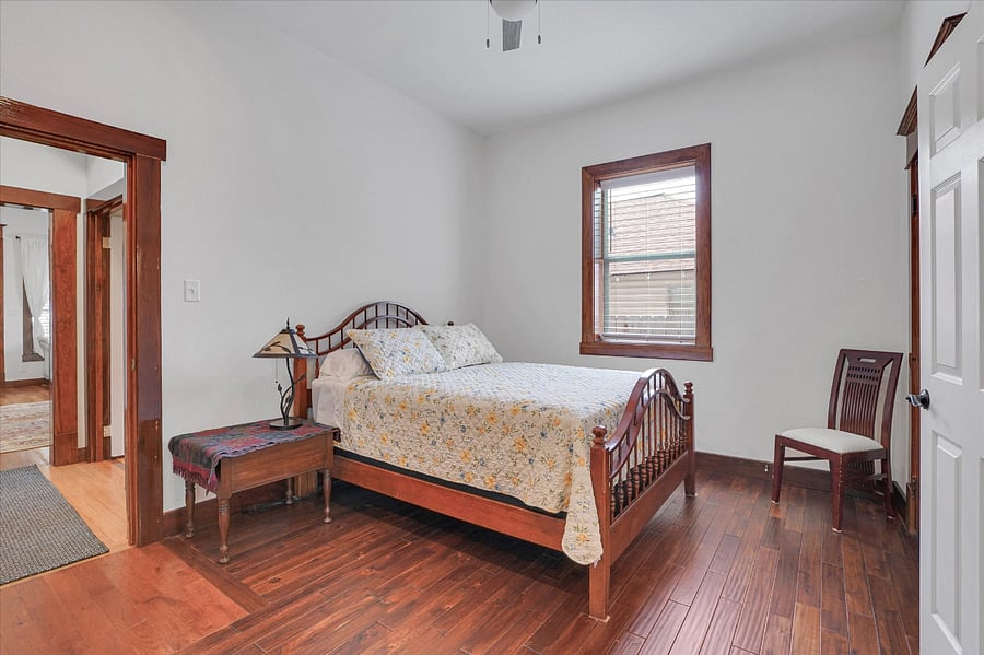 Bedroom #2. Queen bed and twin bed. Downstairs. This bedroom has it's own private full bath and also has a separate rear exit to the driveway.