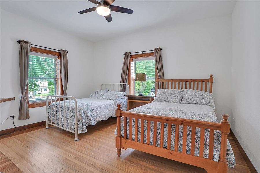 Bedroom #5. Upstairs. Two FULL beds. This bedroom also uses the upstairs common full bathroom.