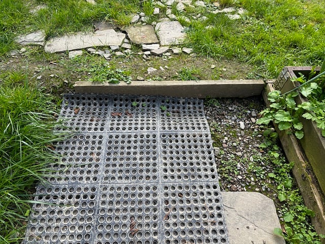 Mud mat to entry way to garage from backyard