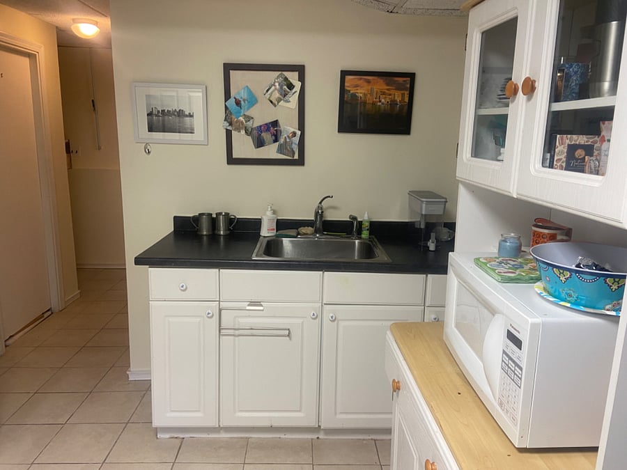 Unit has Microwave, George Forman Grill, Air Fryer, Toaster, Kerig Coffee Maker, Stove Plate