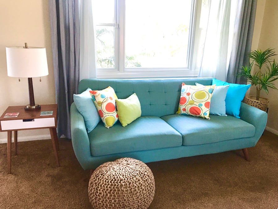 Lively, mid century modern colors and decor! Room includes smart tv!