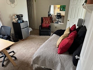 sitting and work area of 2 room suite