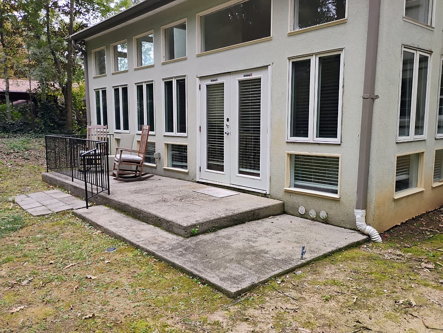 Rear patio to fenced back yard.