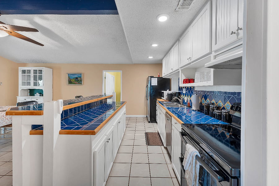 The large kitchen island opens up into the dining room for plenty of seating.
