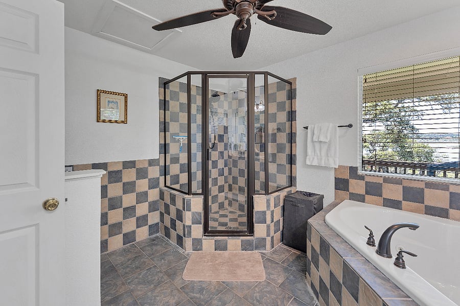 Large Walk-In shower and tub to soak your stress away.