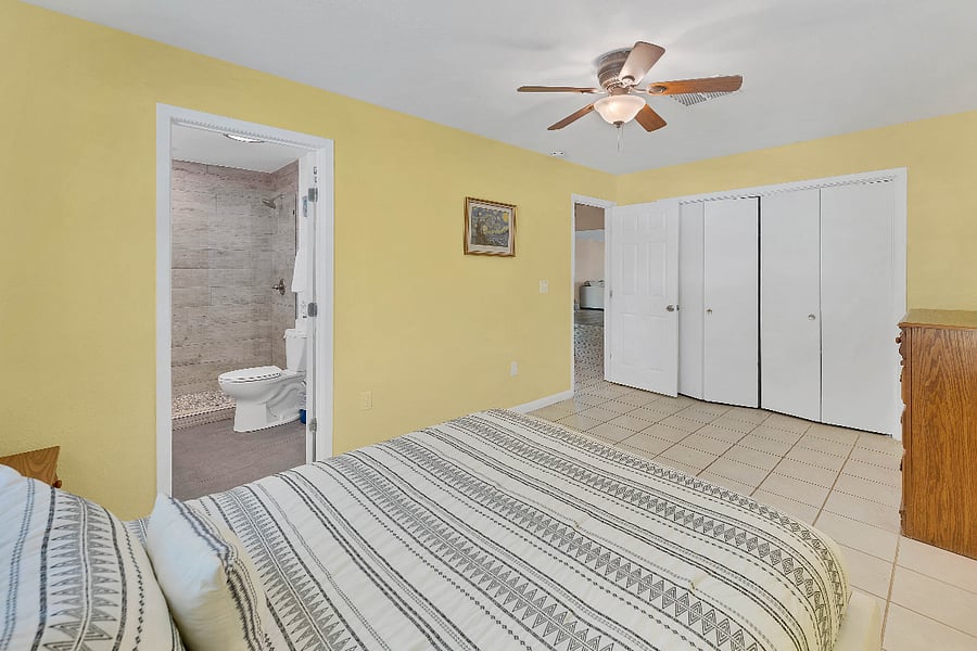 Cozy secondary bedroom with Queen bed. Includes nightstands with drawers and dresser for extra storage
