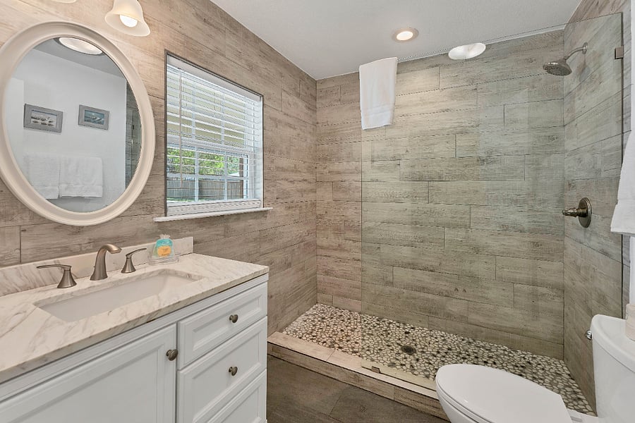 Full bathroom in second bedroom with walk in shower.