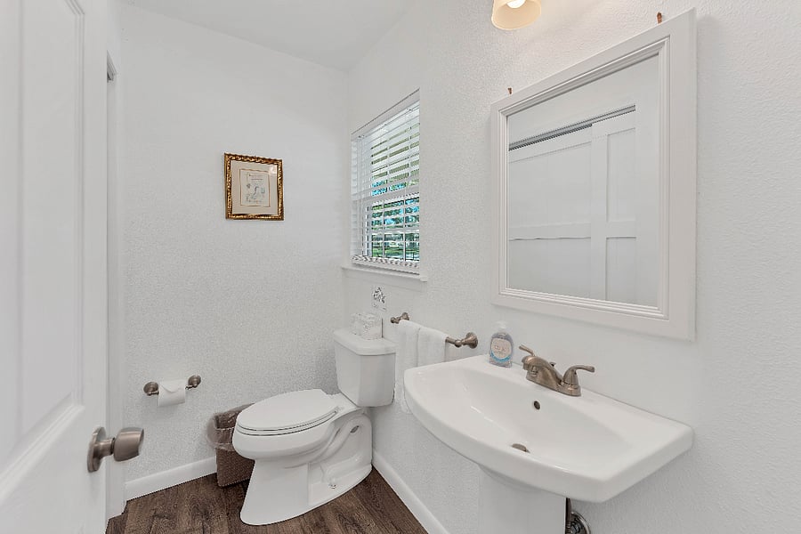 Half Bathroom located near the third Bedroom and front entryway.