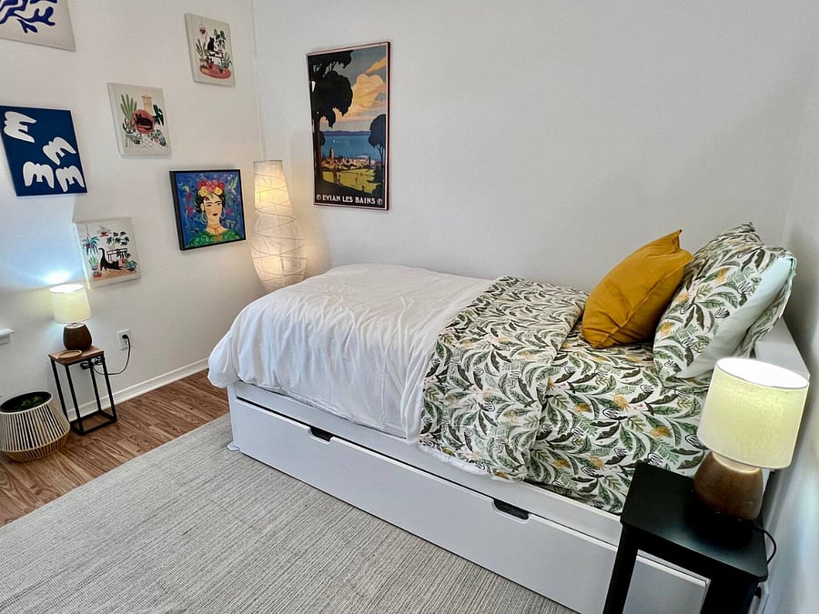 Looky there, a twin bed with a twin trundle tucked below.