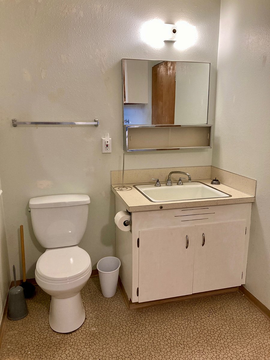 Vanity and large medicine cabinet.