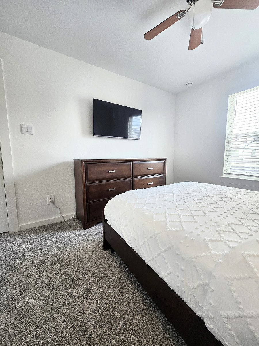 Queen Bedroom1 with dresser and smart tv