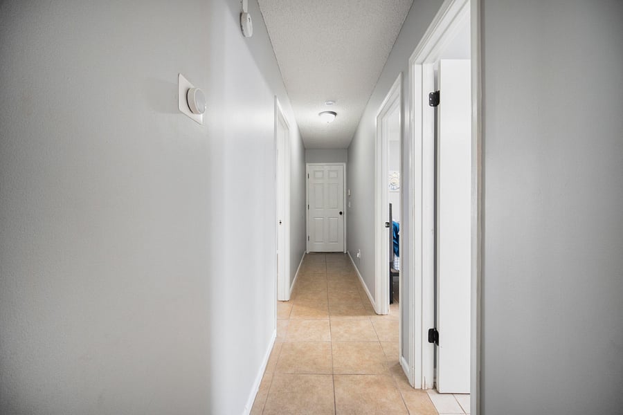 Hallway to the garage/ pool table area