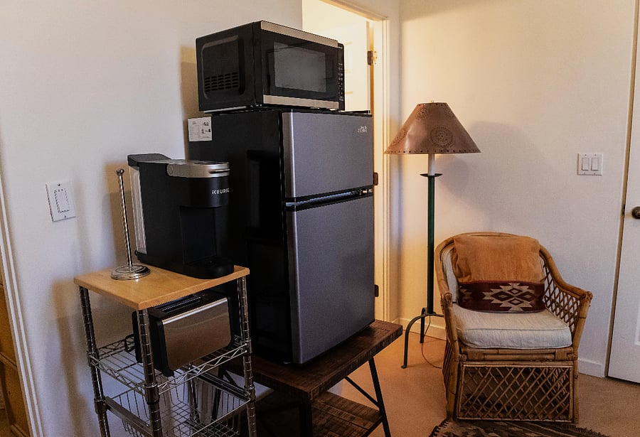 View of Kitchen area and Armchair
