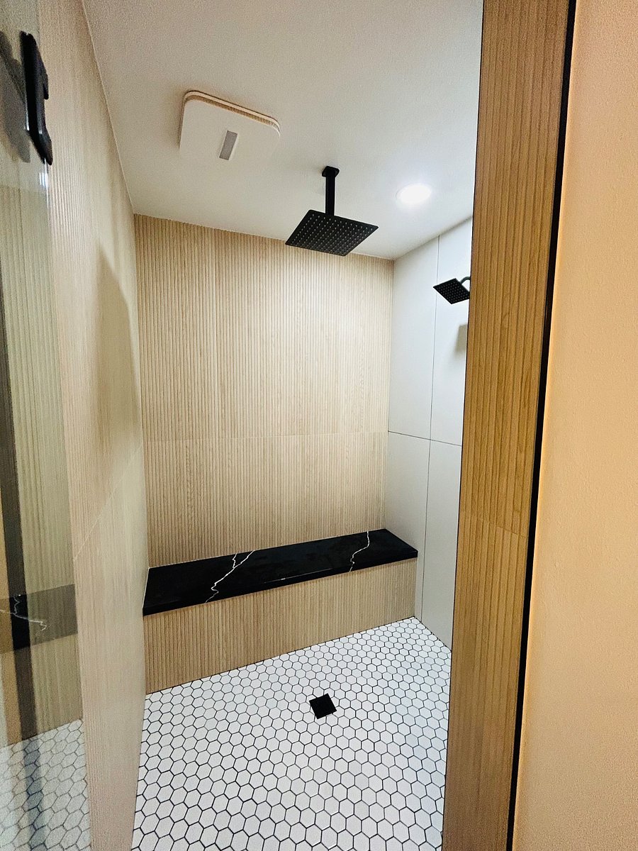 Primary with walk in shower which features relaxing rain shower!  