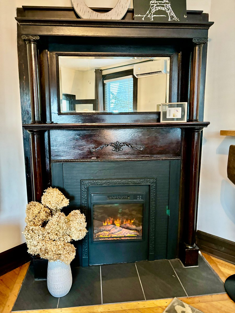 Electric fireplace with heat and remote.