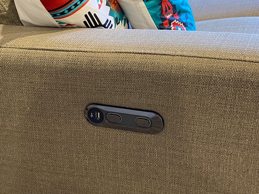 Reclining couch on both ends along with USB outlets