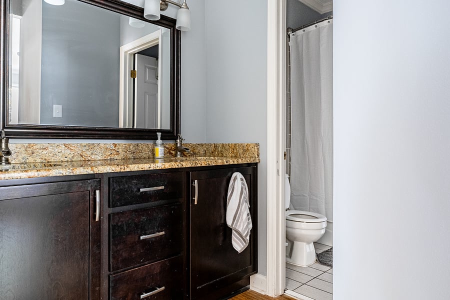Primary ensuite bathroom with double vanity. 
