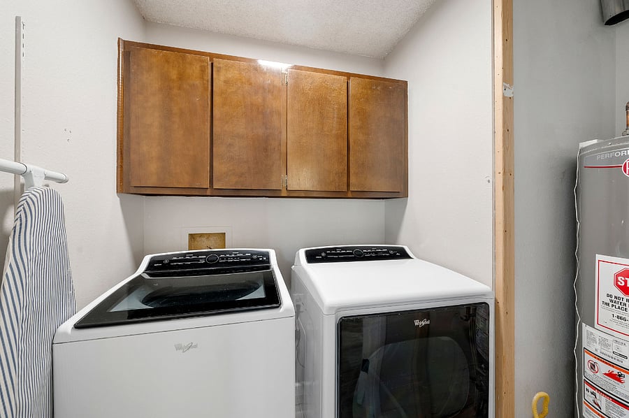 Laundry room located on upper level.