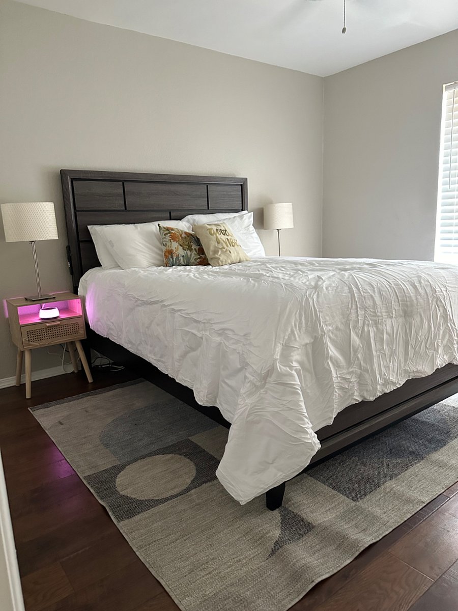 master bedroom features queen bed and large closet