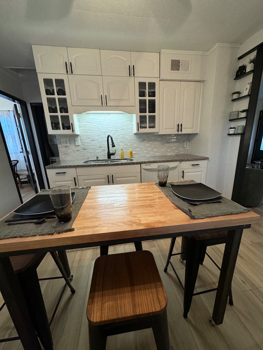 Kitchen facing sink.
