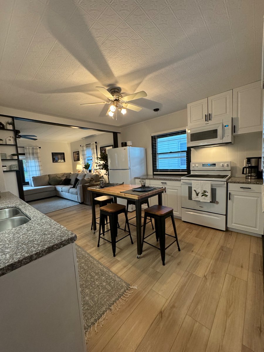 Kitchen opens to living room