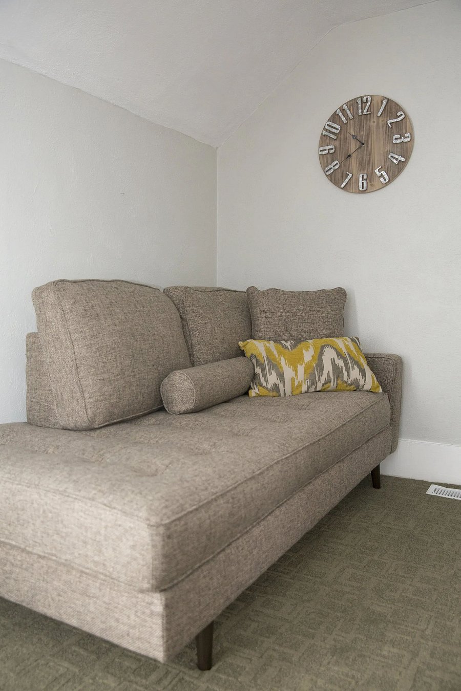 Couch, located in bedroom