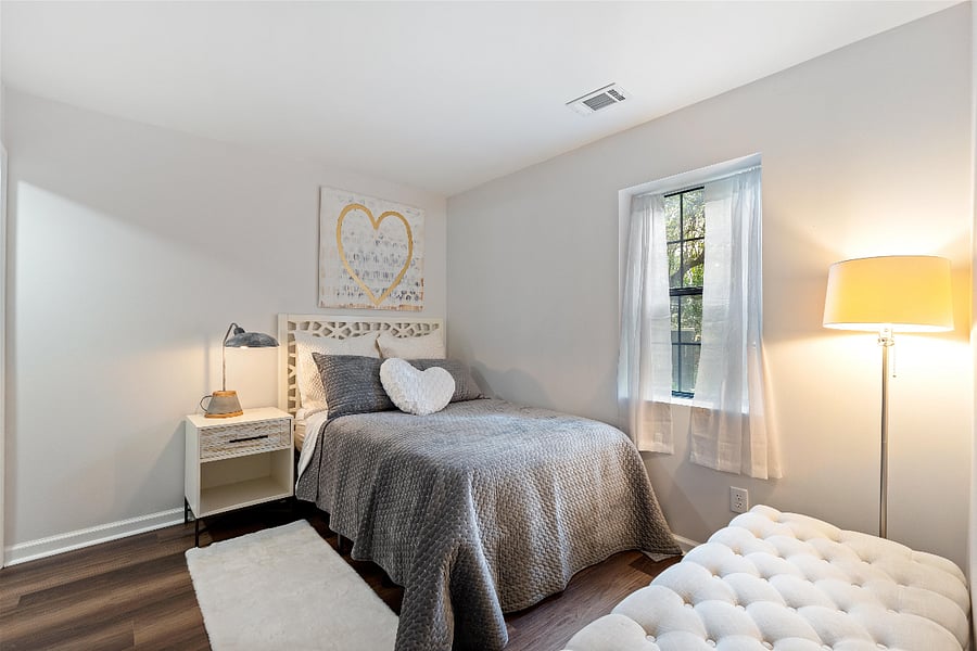 Full size bedroom has walk-in closet.