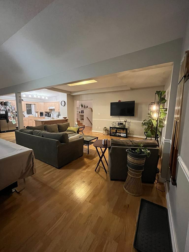 Open concept living space, 60 inch smart TV, 