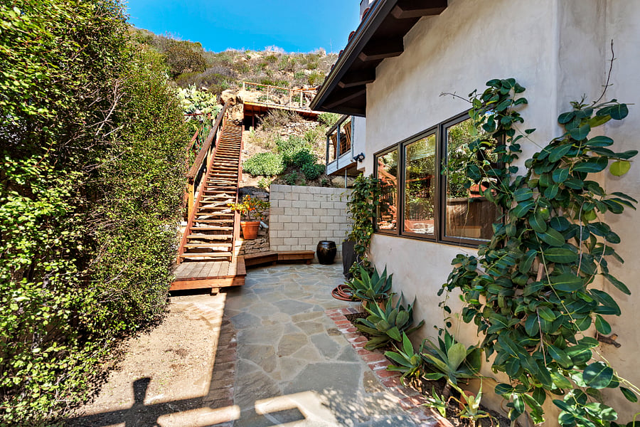 Window outside the breakfast nook that faces the garden and avocado trees