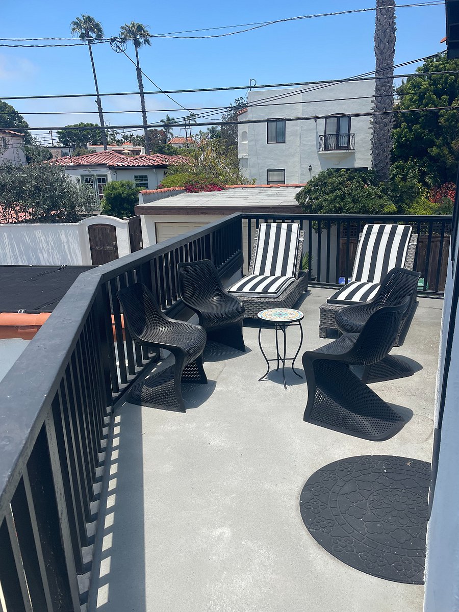 Private Patio with loungers and small table and chairs