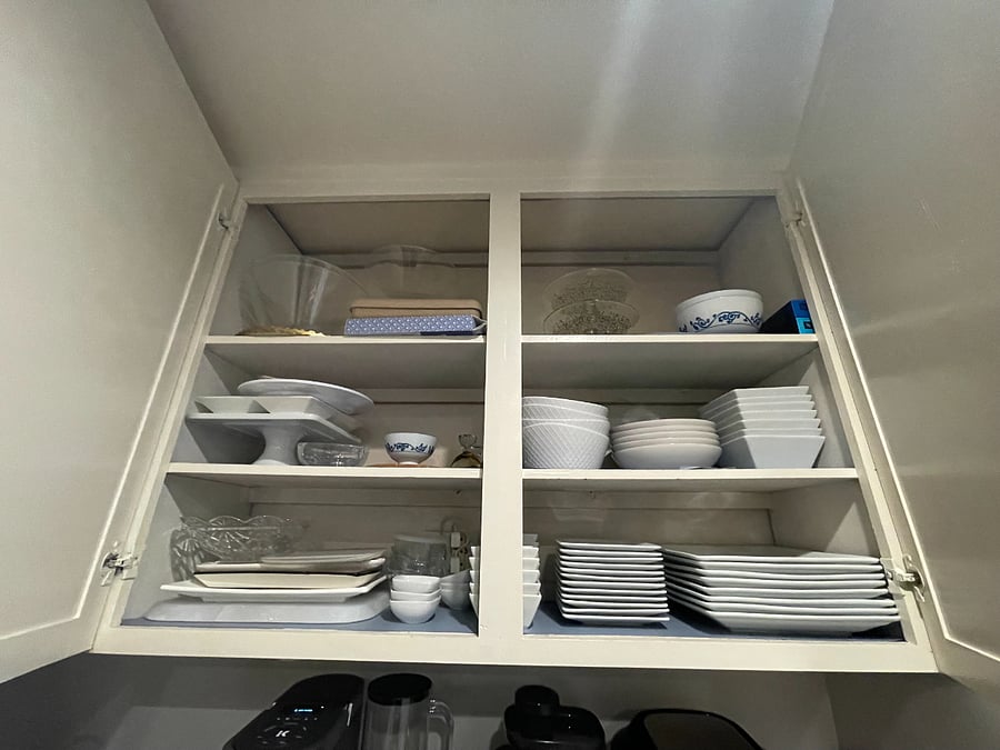 fully stocked cabinents with enough dishware for 8