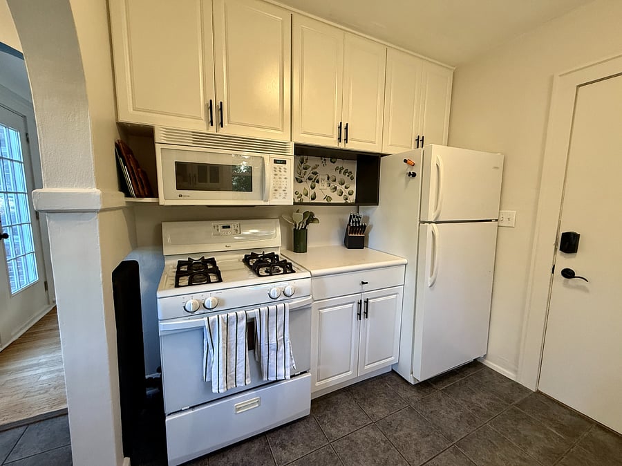 Kitchen cooking area. Fully stocked with cooking and baking necessities.