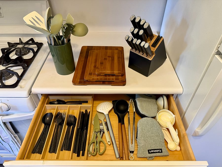 Cutlery, sharp knives, utensils, cutting boards.