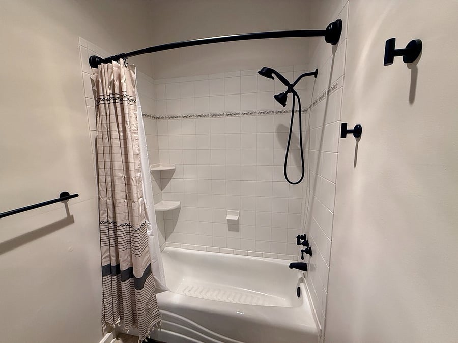 En-Suite Full Bathroom attached to the Second Bedroom.