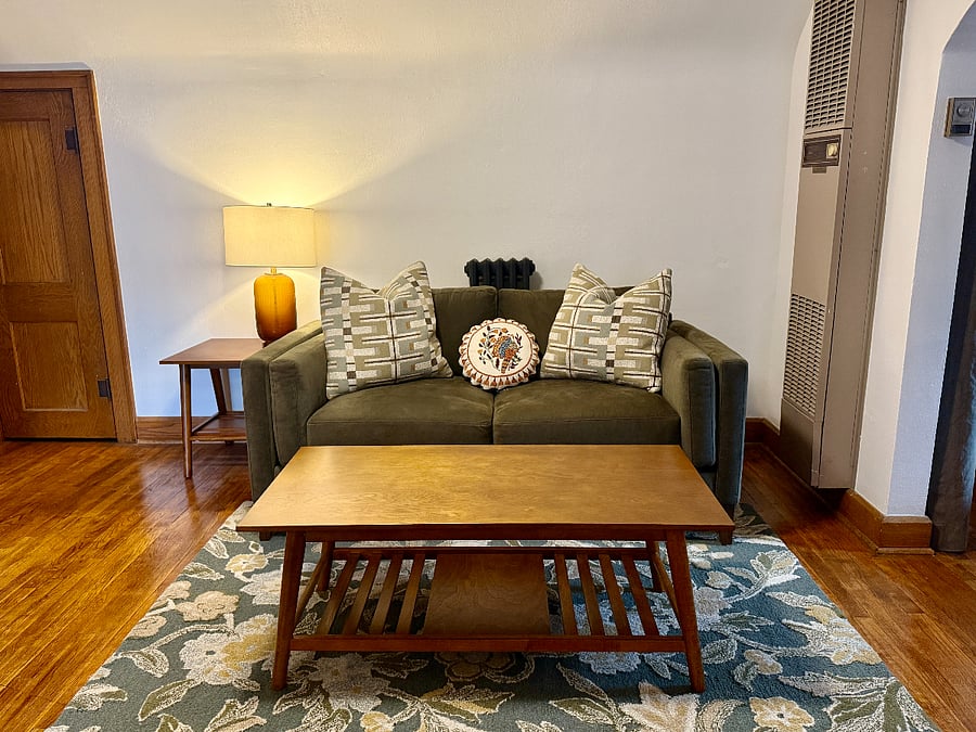 Living Room with wall-mounted heater.