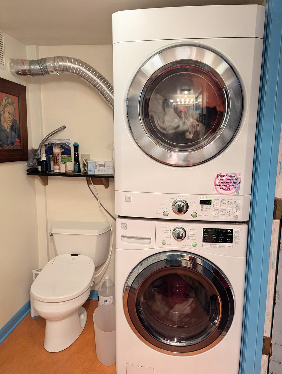 Washer + dryer in your bathroom, shared on an agreed upon schedule with the homeowners