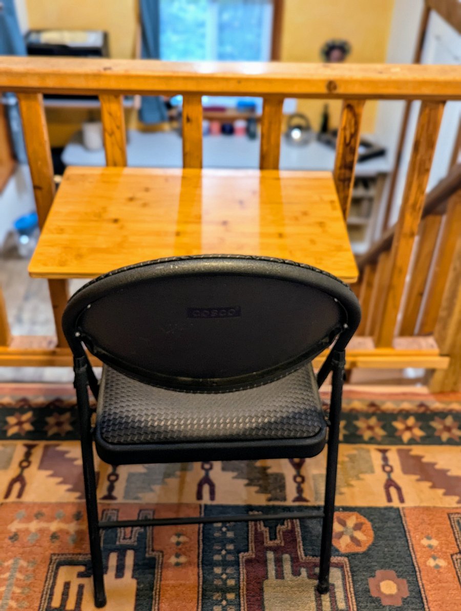 Dedicated workspace with drop down laptop table