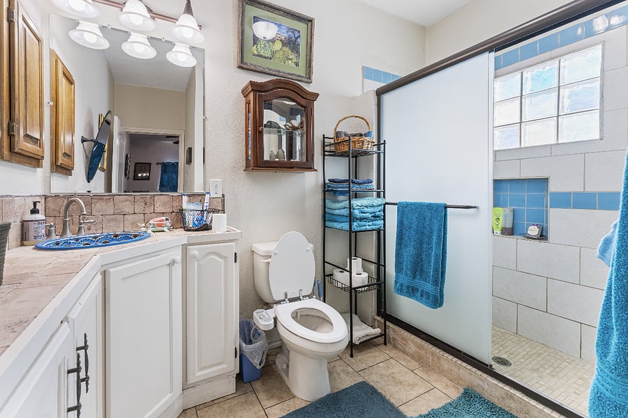 Cute bathroom with bidet, walk-in shower with bench seating. Many beginning amenities provided: razors, shaving cream, toothbrushes and toothpaste, floss, facemask, liquid and bar soaps, makeup wipes, shampoo, conditioner, etc