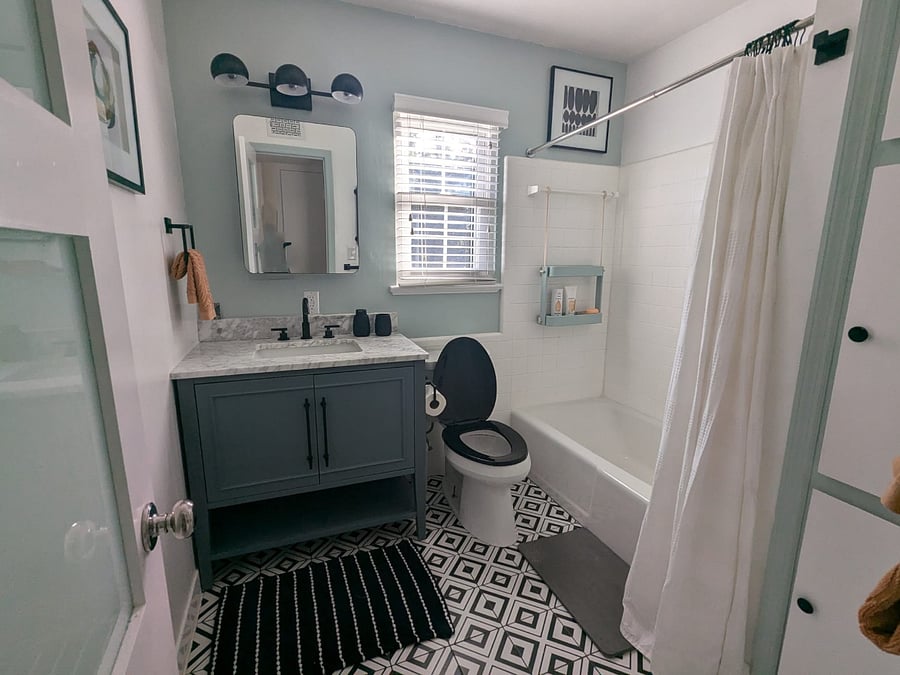 Bathroom. Plenty of storage and has a heated towel rack on the front wall