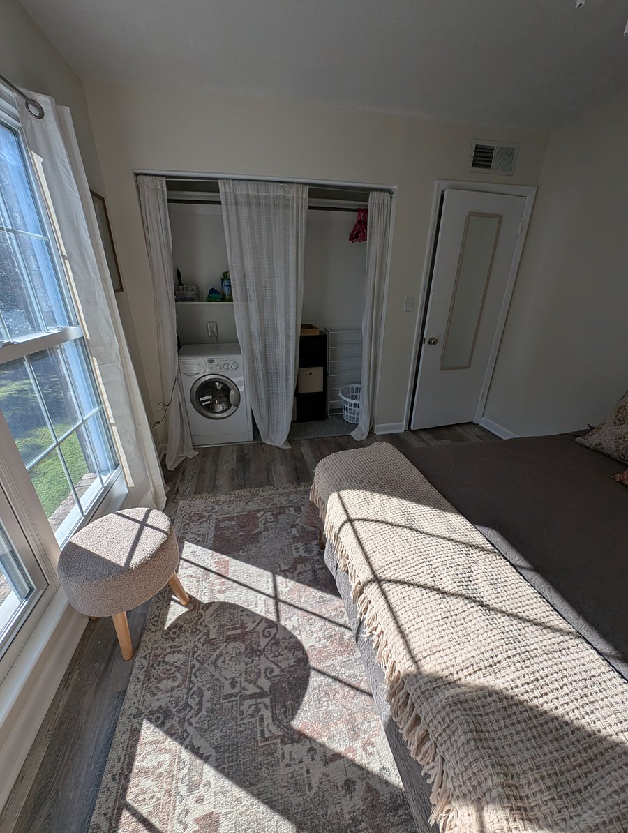 bedroom 2: laundry area (washer/dryer unit) and closet space