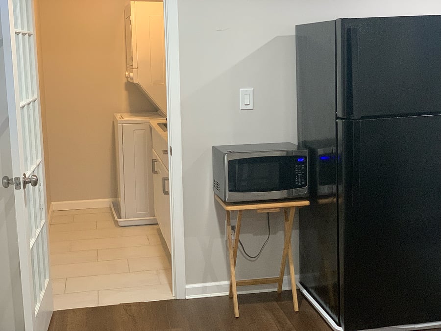well-appointed washroom, a fully equipped kitchen with modern appliances, and all essential utilities for a comfortable and convenient stay