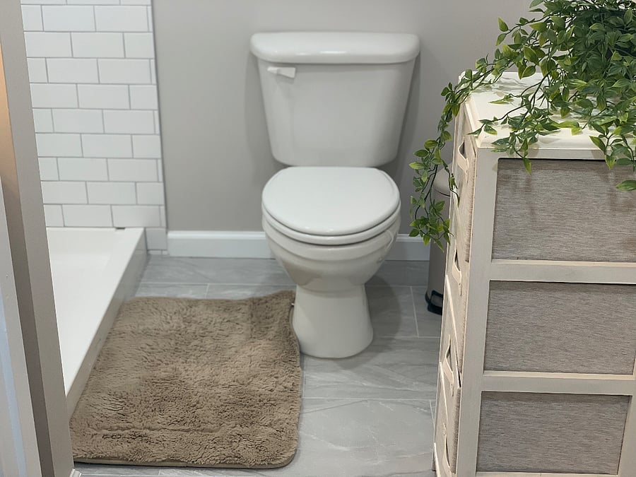Full bathroom featuring modern, functional amenities designed for both style and convenience."