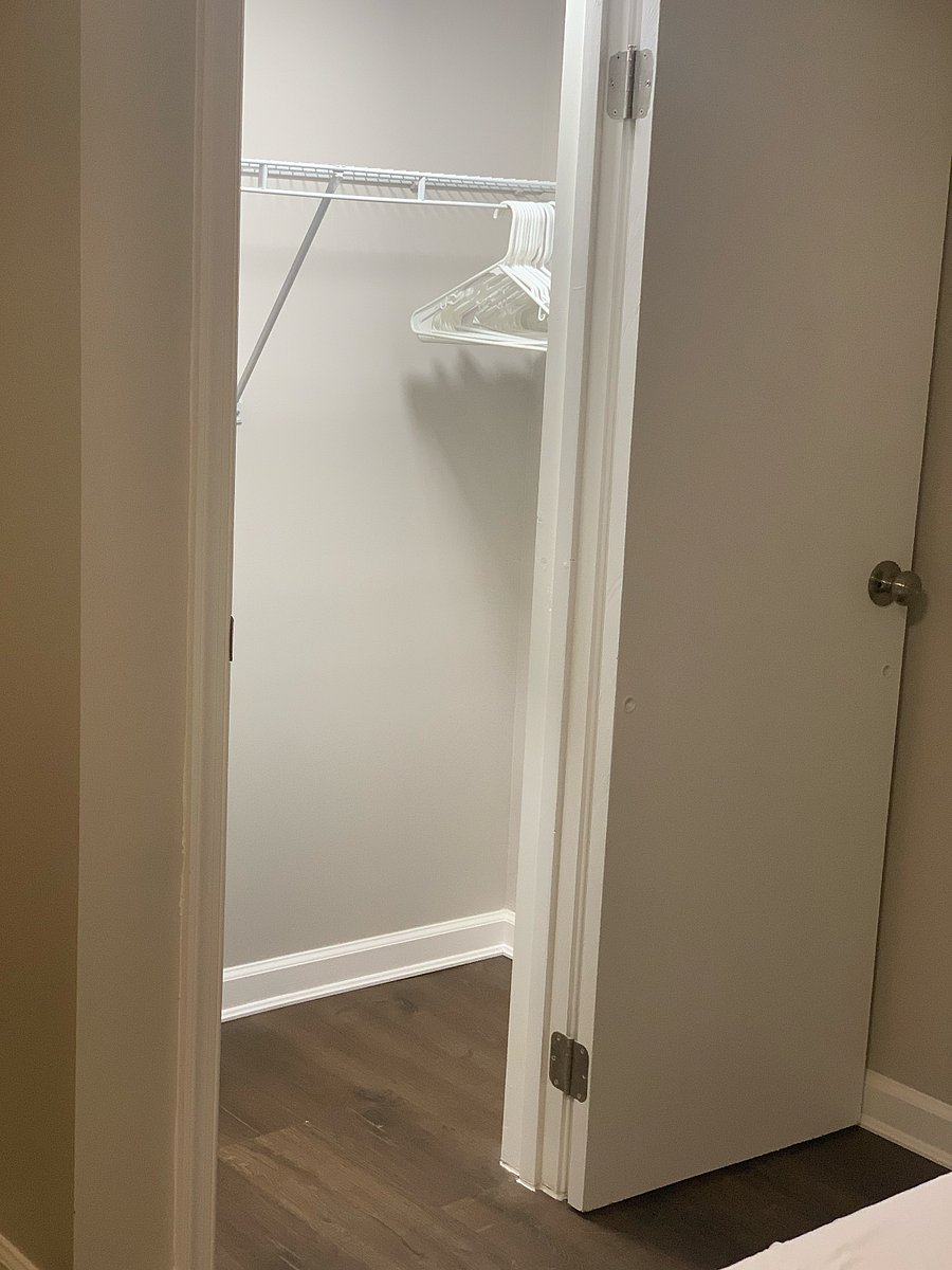 closet providing ample storage for even the most discerning tastes. 