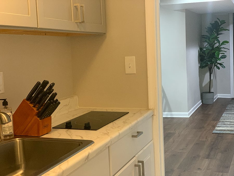 well-appointed washroom, a fully equipped kitchen with modern appliances, and all essential utilities for a comfortable and convenient stay