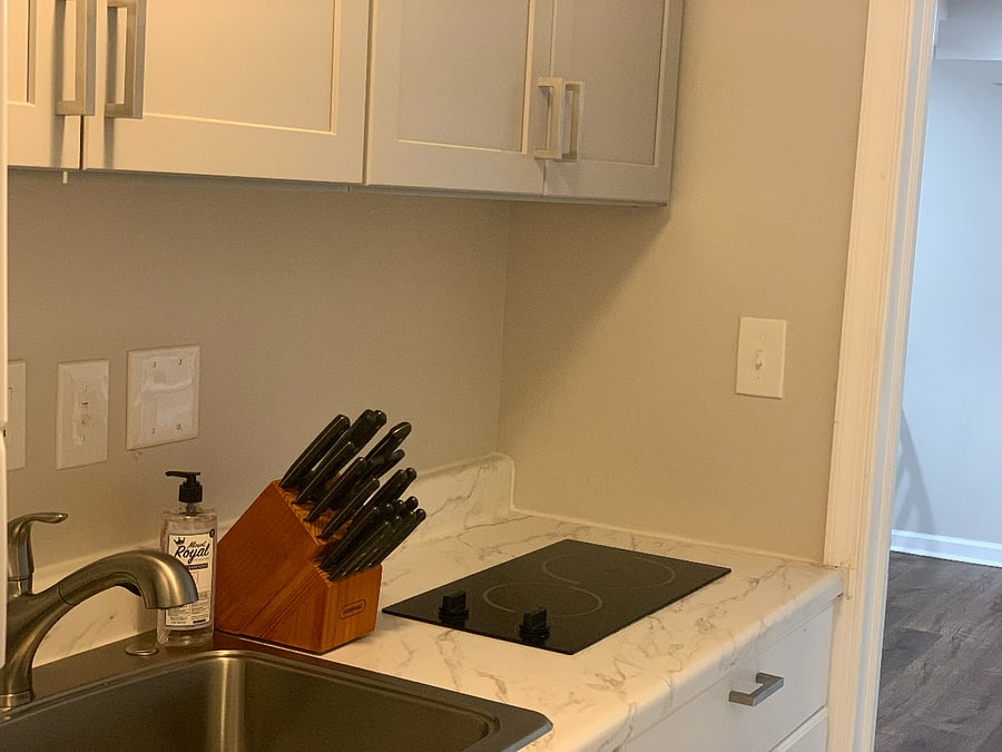 well-appointed washroom, a fully equipped kitchen with modern appliances, and all essential utilities for a comfortable and convenient stay