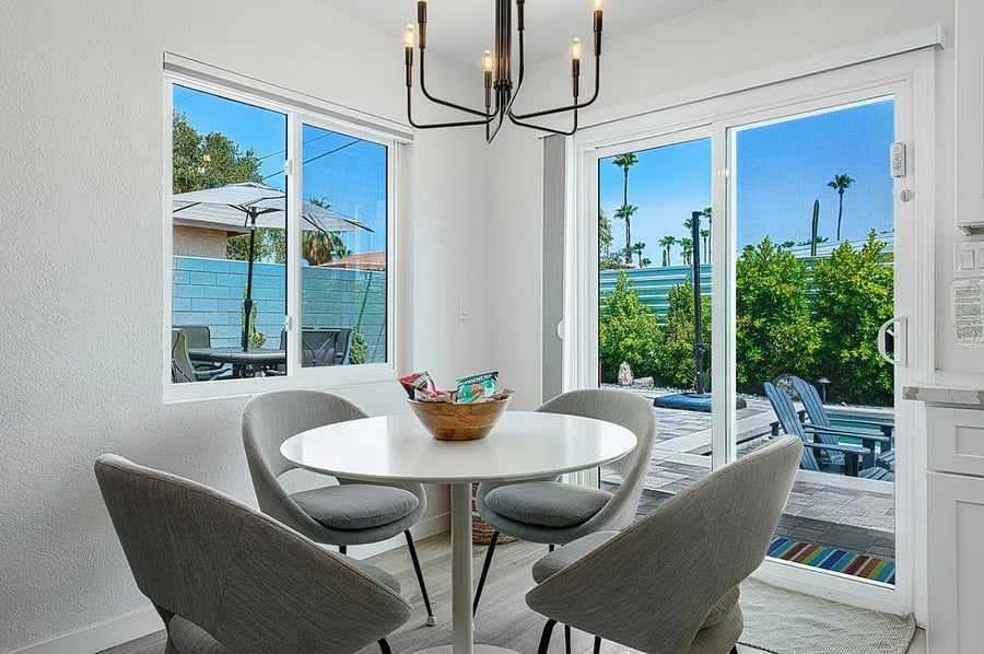 A cozy dining area sits just off the kitchen, perfect for shared meals or remote work sessions.