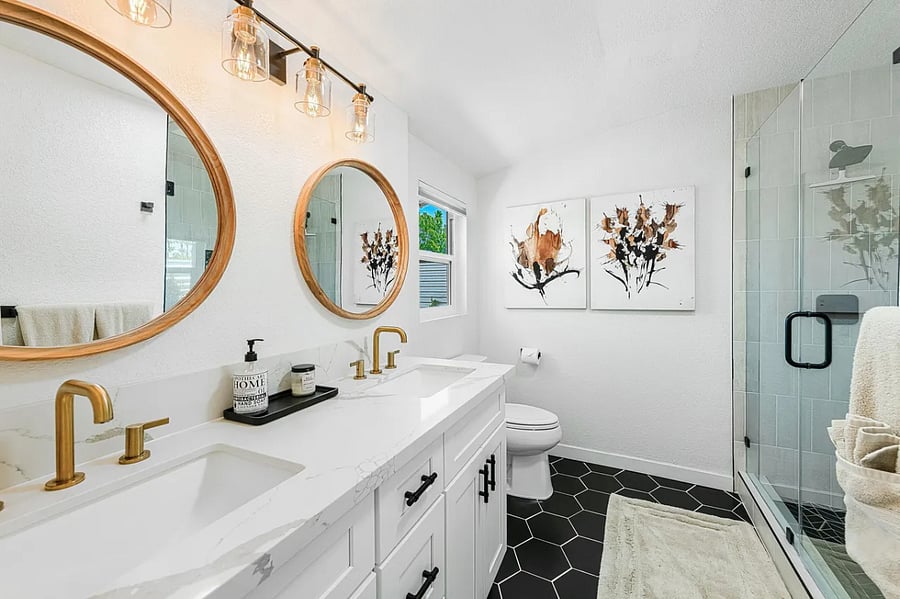 Enjoy a refreshing rinse in the glass-enclosed shower, stocked with essentials to get you started.